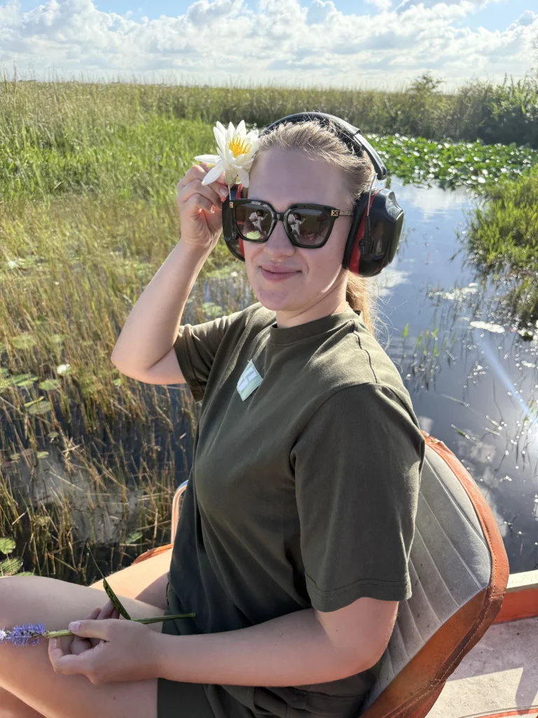 Guest wearing ear protection on a private Everglades airboat ride